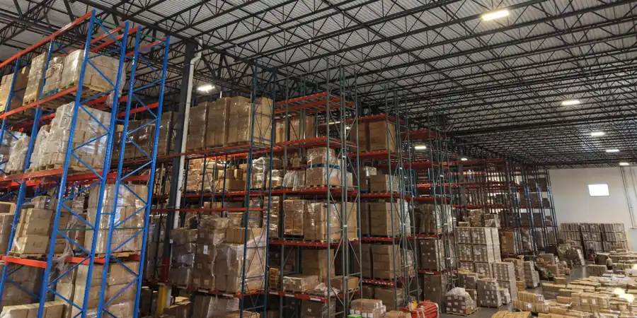 Palletised cartons staged for prep and value-added work